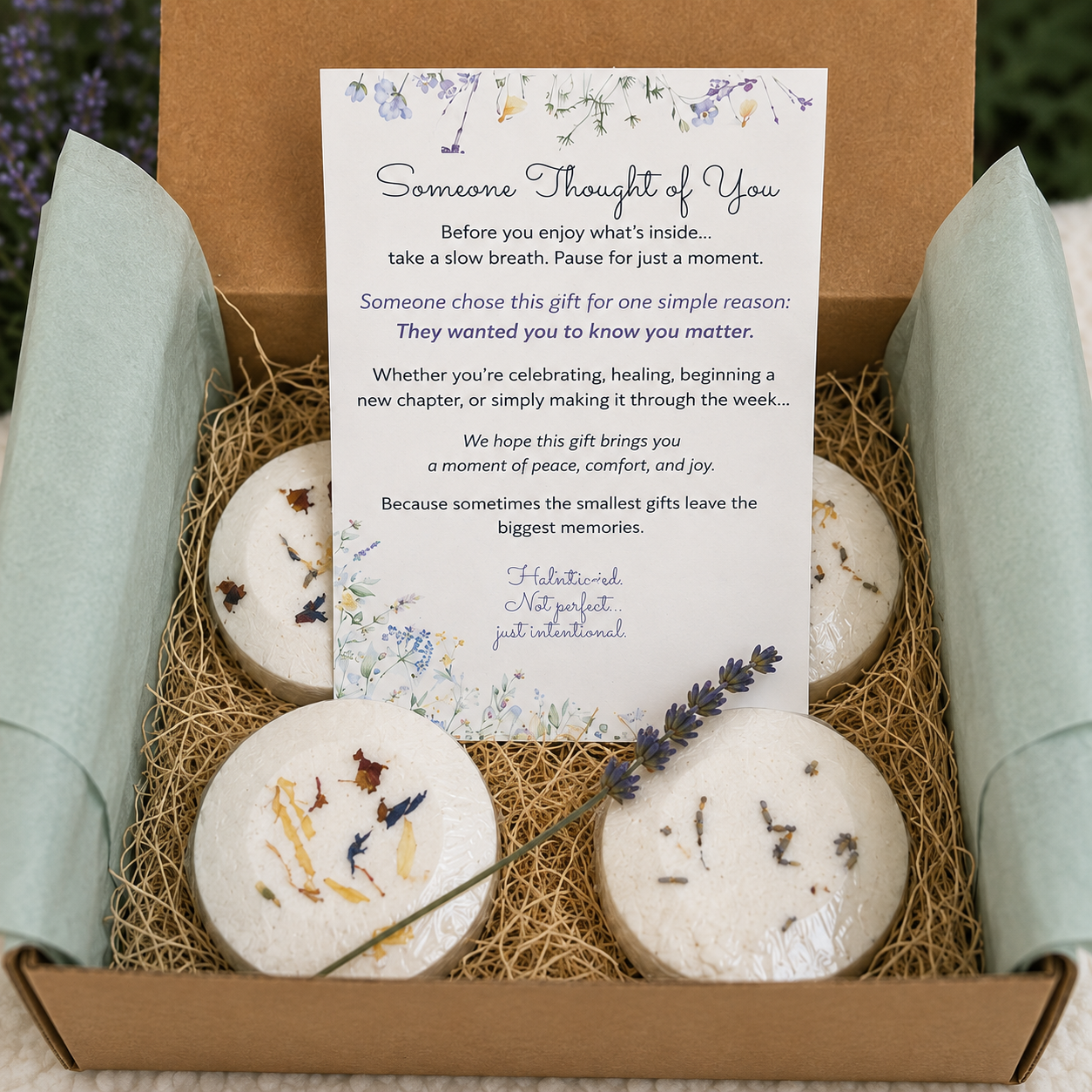 Shower Reset Gift Set in an open kraft box with four aromatherapy shower steamers, natural excelsior, sage tissue paper, and Someone Thought of You card.