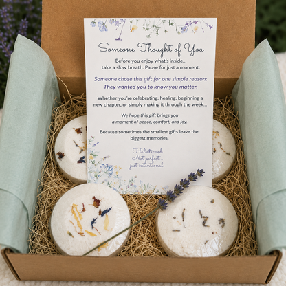 Shower Reset Gift Set in an open kraft box with four aromatherapy shower steamers, natural excelsior, sage tissue paper, and Someone Thought of You card.