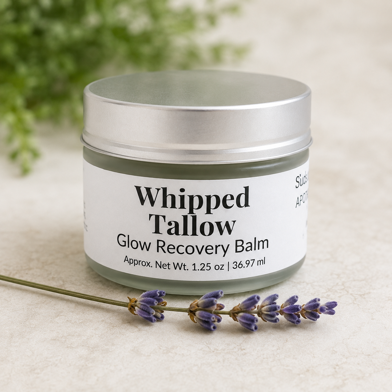 Whipped Tallow Glow Recovery Balm jar styled with lavender for a natural skincare self care gift
