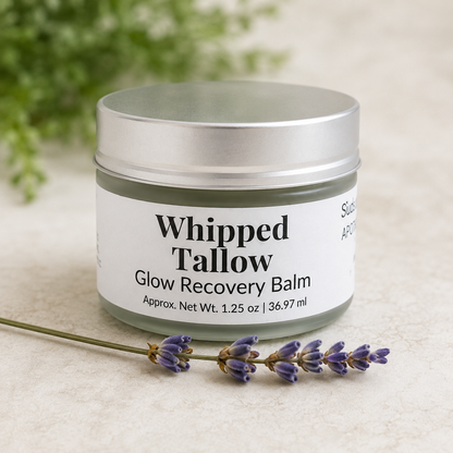 Whipped Tallow Glow Recovery Balm jar styled with lavender for a natural skincare self care gift
