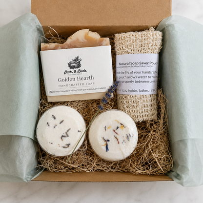 A Little Kindness gift box with Golden Hearth handmade soap, two shower steamers and a natural soap saver pouch